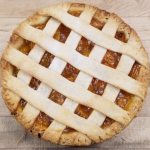 Apricot fruit pie with lattice pastry top.