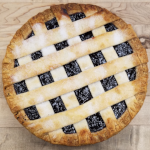 Blackberry fruit pie with lattice pastry top.